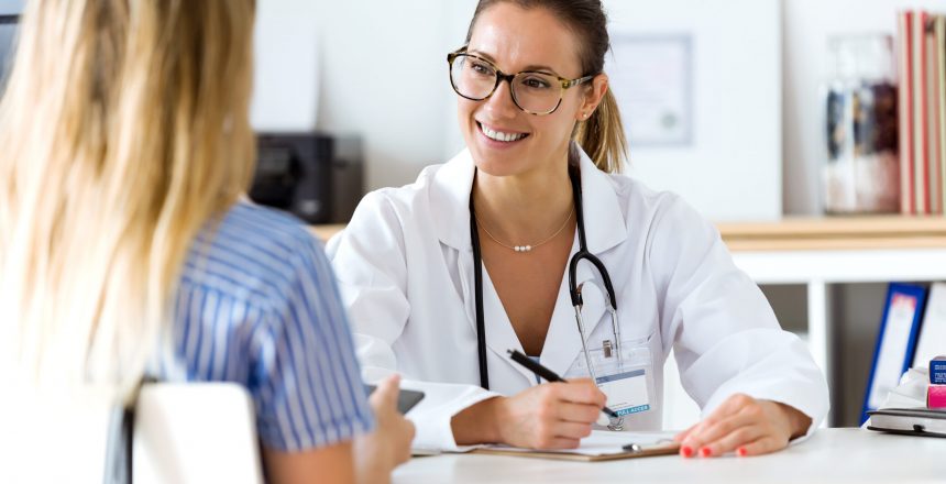 Portrait of female doctor explaining diagnosis to her patient.